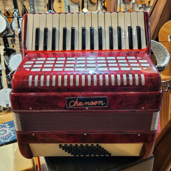 Chanson 48b piano accordion.  red pearl, 2vce, good but needs better straps