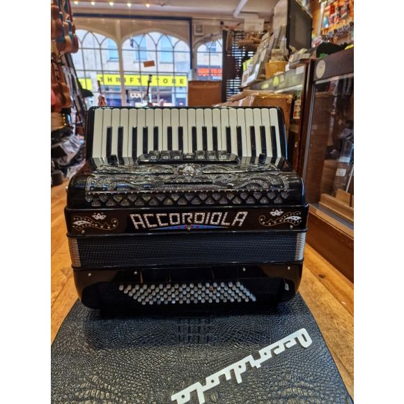 Accordiola 96b, 4vce, black,  made by Mengascini. VGC, c/w Orla midi module (untested)